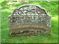 NZ0461 : Bywell St. Peter - gravestone by Mike Quinn