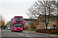 Bus passing Cottage Close, Sydenham estate