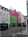 Brightly coloured buildings on Tontine Street