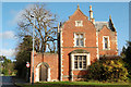 Former hospital lodge beside A4177 near Hatton