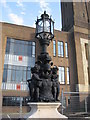 Statue (one of a pair ) at the entrance to the (former)  Gillette Factory,  Isleworth, London