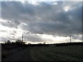 The Gallops at Aldbury against a Lowering Sky