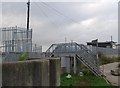 Riverside footpath crosses the seawall near Grays Terminal