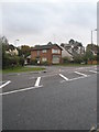 Looking across London Road towards Milbeck Close