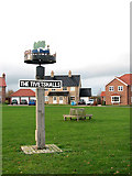 TM1686 : Tivetshall village sign by Evelyn Simak