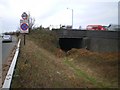 Disused railway bridge in the middle of the A41