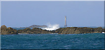 SV8306 : Western Rocks, Scilly, with the Bishop Rock Lighthouse by John Rostron