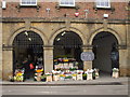 Greengrocer and Flower seller in the Town Hall, Langport, Somerset