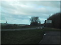 A40 passes the turning to Compton Abdale