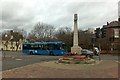 A Trent Barton no. 18 passes the Beeston War Memorial