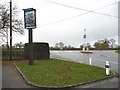 Pub sign at road junction