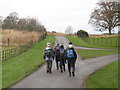 Walkers passing the entrance to Cliffe Hall, Piercebridge