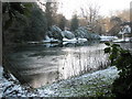 Partially frozen pond as seen on the footpath to Mare Hill