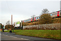 Train on embankment, Milverton