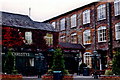 W6175 : Blarney - Christy's Pub and Blarney Woollen Mills Store by Joseph Mischyshyn