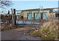 Disused yard and buildings near the railway