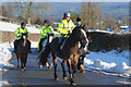 Dayglo riders in the snow