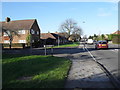 Approaching the junction of Queens Close and of Straight Road