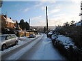 Snow-laden road in Osmotherley