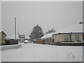 Looking from Hooks Lane into a snowy Barnes Way