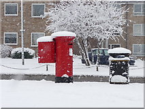 TQ2995 : Pillar Box and Litter Bin in the snow, London N14 by Christine Matthews