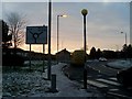 Road sign on approach to roundabout