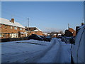 Mid section of a snowy Bransgore Avenue