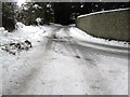 Footpath joins road in Madehurst