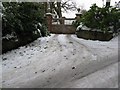 Gated entrance to Highfield House off Baycombe Lane