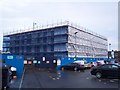 Balmoral Gardens Health Centre under plastic