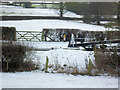 SJ2514 : Gates and locks in the snow by John Firth