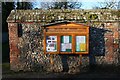 Notice board by the wall