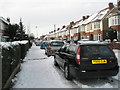 A snowy pavement in Dysart Avenue