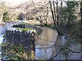 Sharp turn for the River Stor to flow under bridge