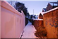 Snowy footpath between the houses, Southborough