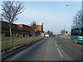 Childwall Valley road with Belle Vale Shopping Centre on the left.