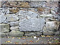 Millstone in Hawarden Castle wall