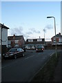 Approaching the junction of  Grove Avenue and White Hart Lane