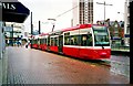 Tramlink tram no. 2544 in red & white livery in Wellesley Road