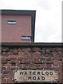 Waterloo Road sign, and dockside apartment