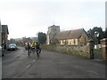 Cyclists passing St Mary