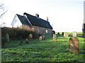 Thatched cottage adjoining All Saints church