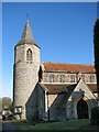 All Saints church - path past the Norman tower