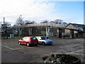 Footbridge and car park at Alness station