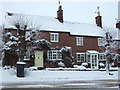 Brick houses on the northeast side of High Street, Hindon