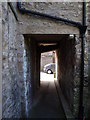 NY7708 : Alley leading from churchyard into Stoneshot by David McMumm