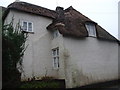 Whitewashed, thatched cottage, Crowcombe