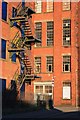 Mill with cast iron fire escape