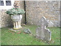 Unusual plant pot in Churt Churchyard