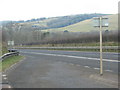 The North Devon Link Road drops towards the valley of the River Mole